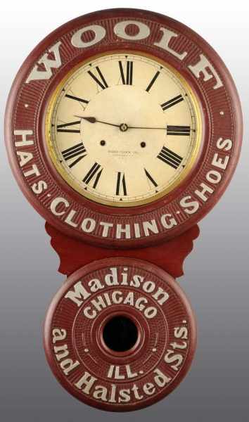 Appraisal: Woolf Clothiers Baird Clock Description A very rare Baird clock