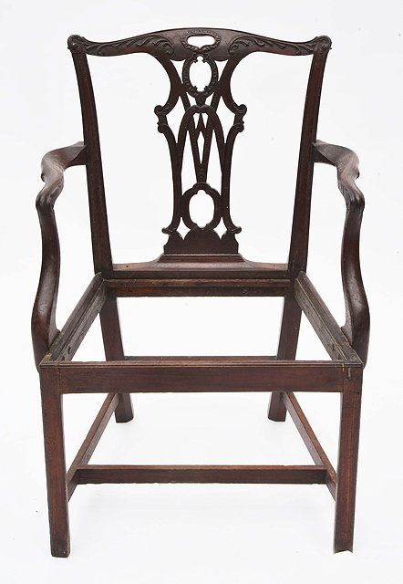 Appraisal: A CHIPPENDALE STYLE MAHOGANY CARVER ARMCHAIR with pierced splat and