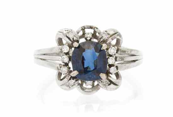 Appraisal: An Karat White Gold Sapphire and Diamond Ring containing one