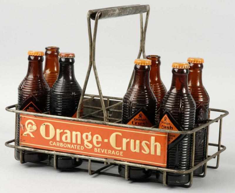 Appraisal: Orange Crush Bottle Carrier Description Nice heavy metal frame construction