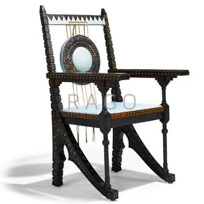 Appraisal: CARLO BUGATTI Armchair Italy ca Italian walnut leather copper pewter