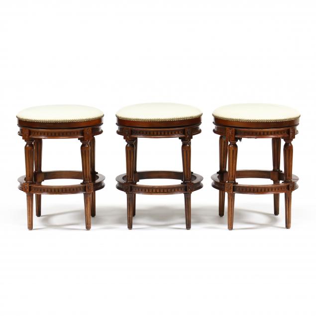 Appraisal: ALEXEEW CO SET OF THREE LOUIS XVI STYLE LEATHER BARSTOOLS