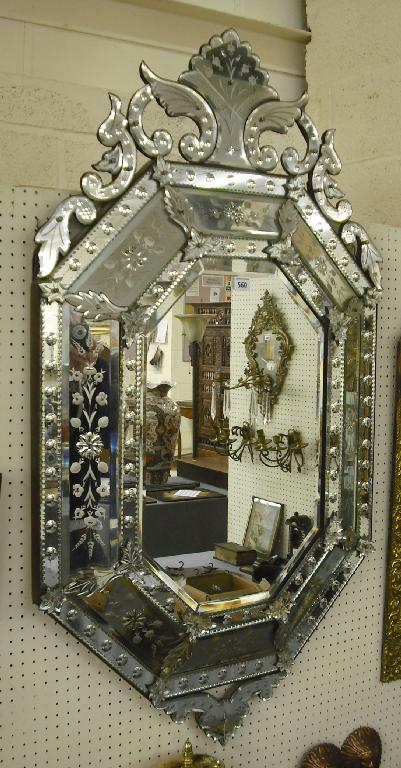 Appraisal: th century Venetian octagonal glass mirror the main bevelled plate