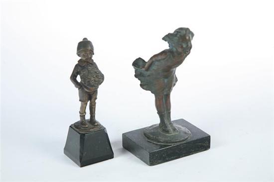 Appraisal: TWO BRONZES OF CHILDREN A boy with bouquet signed for