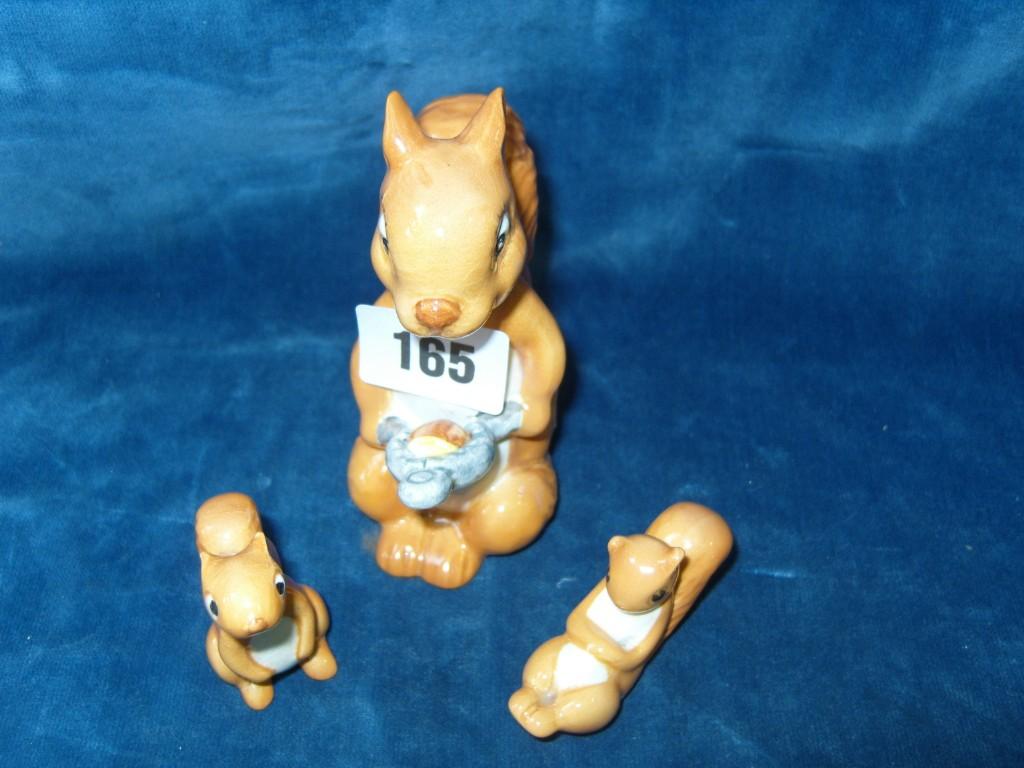 Appraisal: A family of three Beswick squirrels including a large example