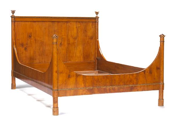 Appraisal: An Italian Neoclassical parcel gilt walnut bed early th century