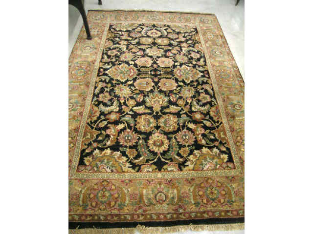 Appraisal: Mahal Persian Handmade Rug elaborate floral indigio field soft border