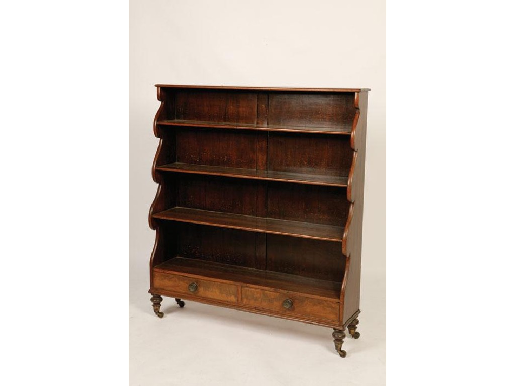 Appraisal: A REGENCY MAHOGANY WATERFALL BOOKCASE with a rectangular top with