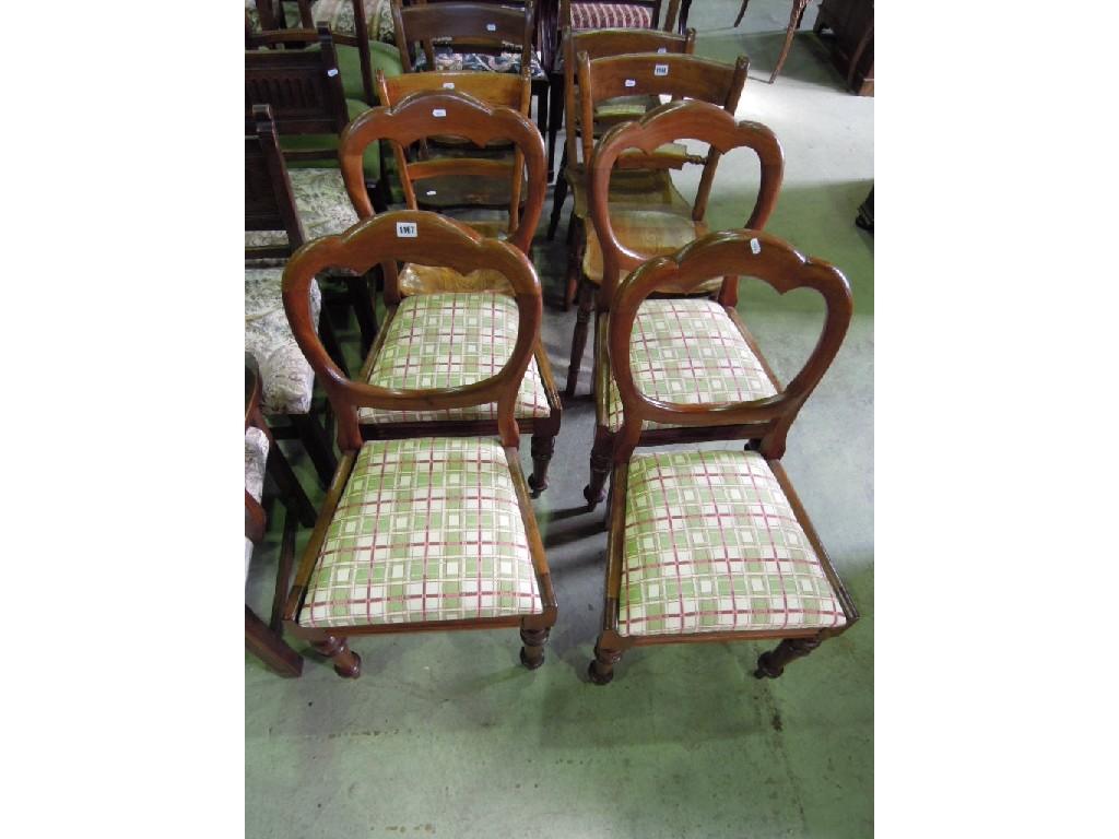 Appraisal: A set of four Victorian mahogany balloon back dining chairs