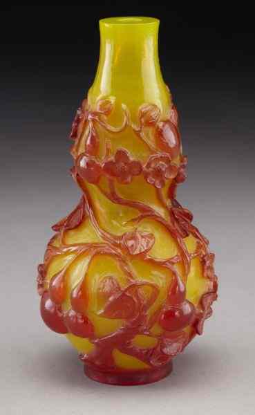 Appraisal: Chinese Qing Peking glass double gourd vasecarved to depict double