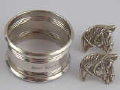 Appraisal: A pair of white metal tests silver cufflinks designed as