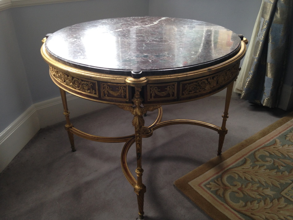 Appraisal: A thC French Empire centre table with circular liver and