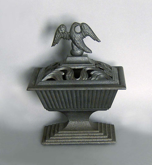 Appraisal: Cast iron stove urn late th c with eagle finial