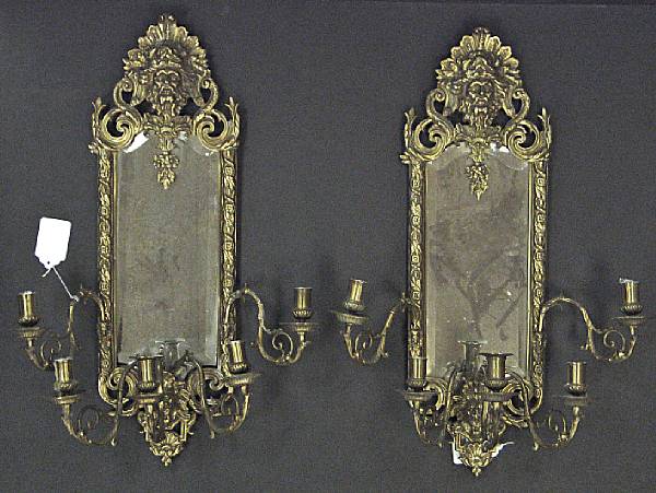 Appraisal: A pair of Renaissance Revival cast brass five-light girandoles late