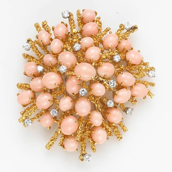 Appraisal: A coral diamond and eighteen karat gold brooch weighing approximately