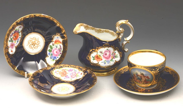 Appraisal: A BERLIN KPM CABINET CUP and saucer painted with putti