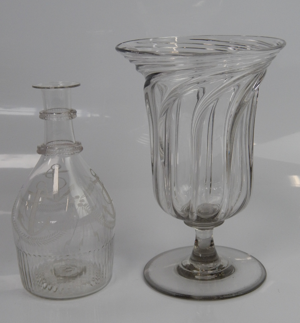 Appraisal: A Victorian whirl fluted glass celery vase on a pedestal