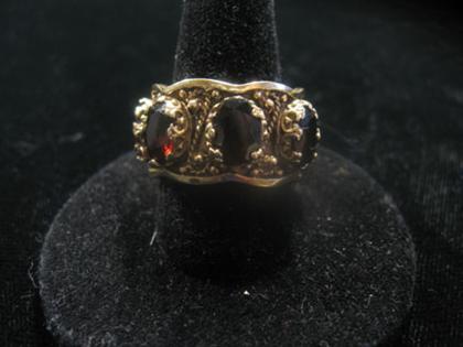 Appraisal: Wide karat yellow gold and garnet band th century Heavy