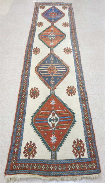 Appraisal: PERSIAN RUNNER AND SMALL MAT both hand knotted the runner