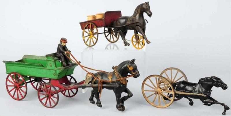 Appraisal: Lot of Horse-Drawn Cart Sulky Toys American Includes one Kenton