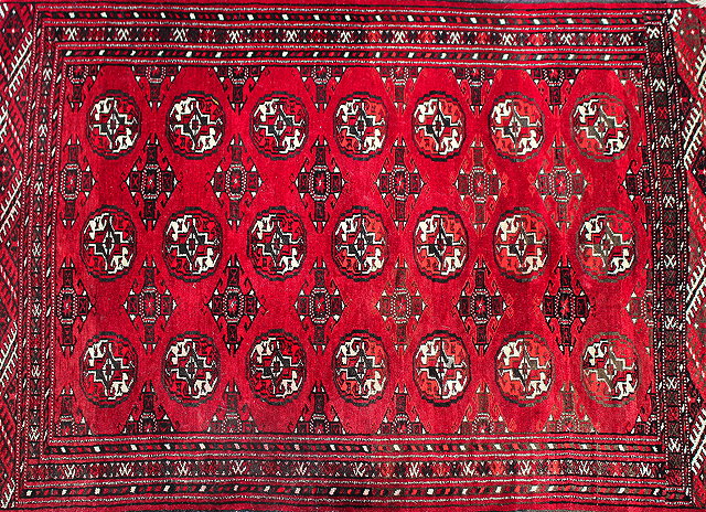 Appraisal: A SMALL ANTIQUE BALUCHI RED GROUND RUG cm x cm