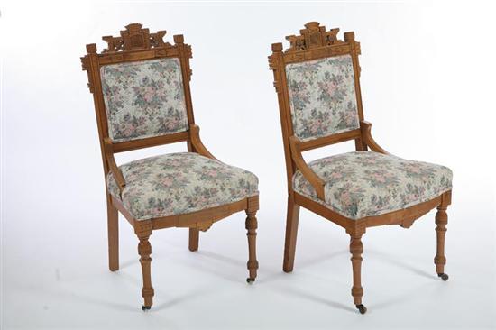 Appraisal: PAIR OF SIDE CHAIRS Walnut Eastlake style chairs with floral