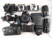 Appraisal: Cameras A Polaroid Vision SLR with Sunpak flash a Canon