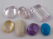 Appraisal: A quantity of loose polished gemstones including three kunzites and