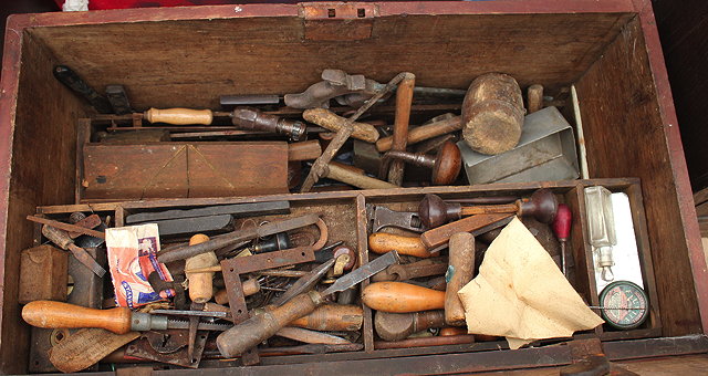 Appraisal: A GOLD ELM PAINTED TOOL CHEST with fitted interior containing