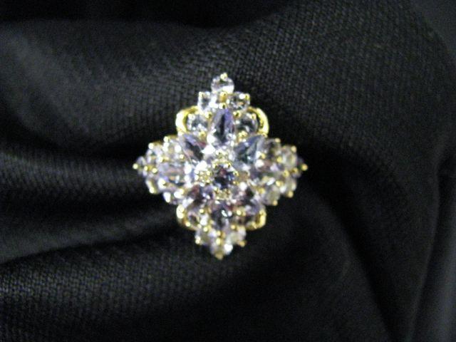 Appraisal: Tanzanite Ring cluster of pear round gems totaling carats in