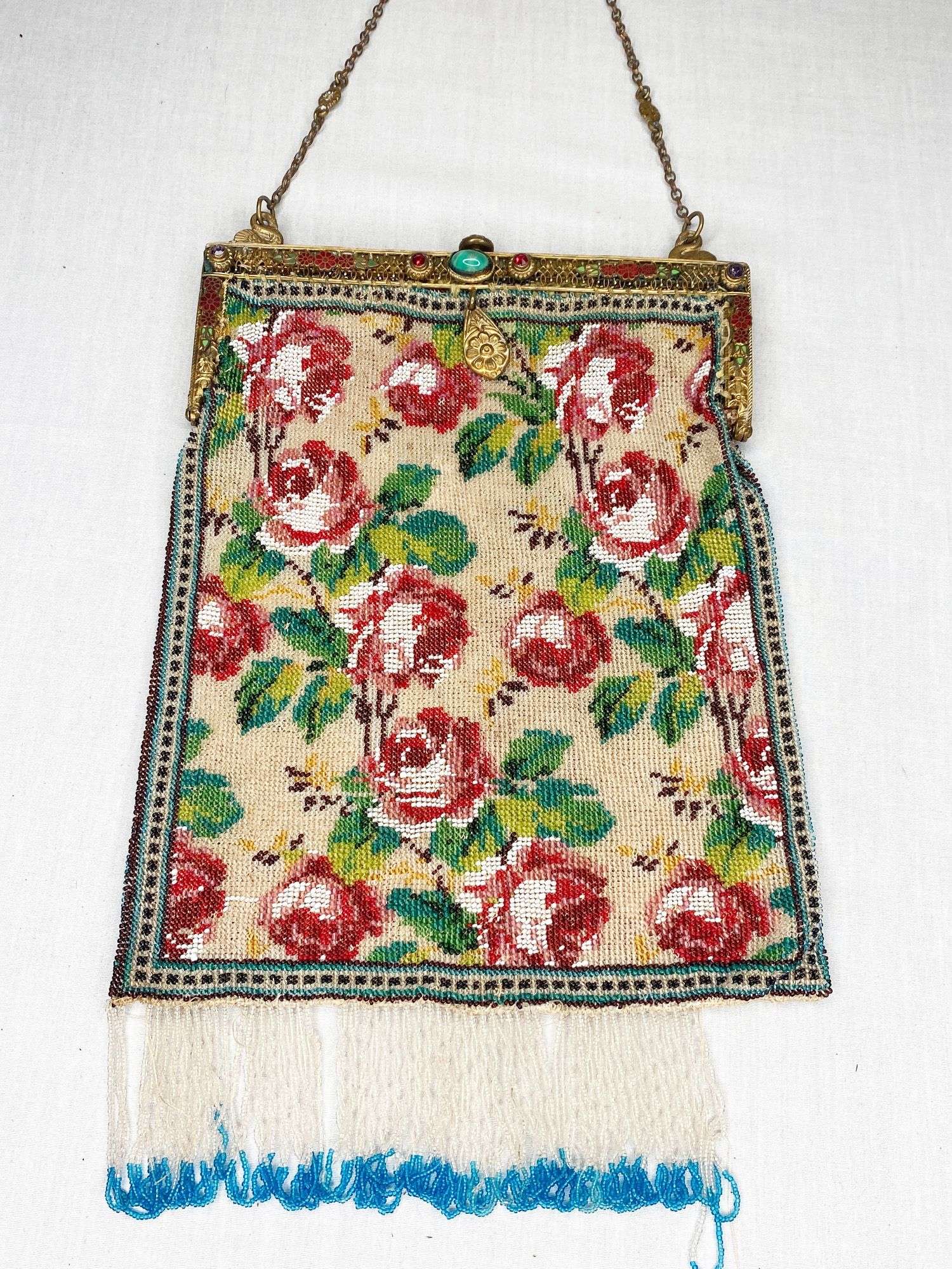 Appraisal: Micro Beaded Hand Bag with Roses and Enameled Frame long