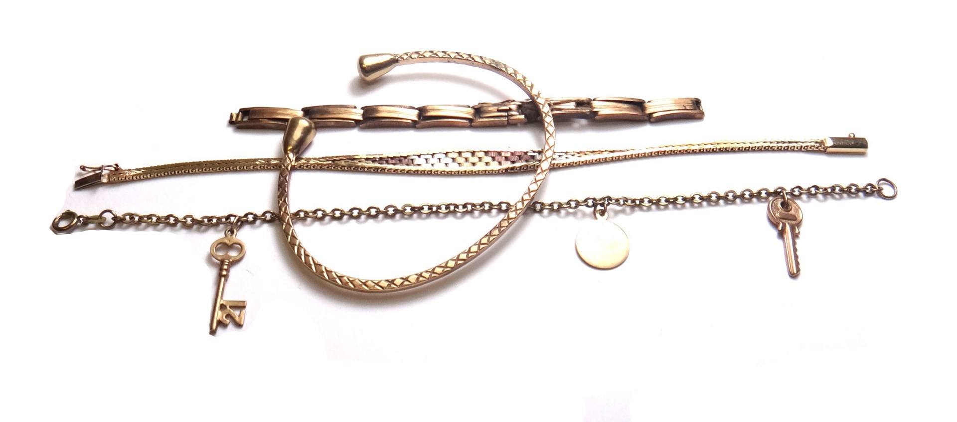 Appraisal: A ct three colour gold bracelet in a brick link