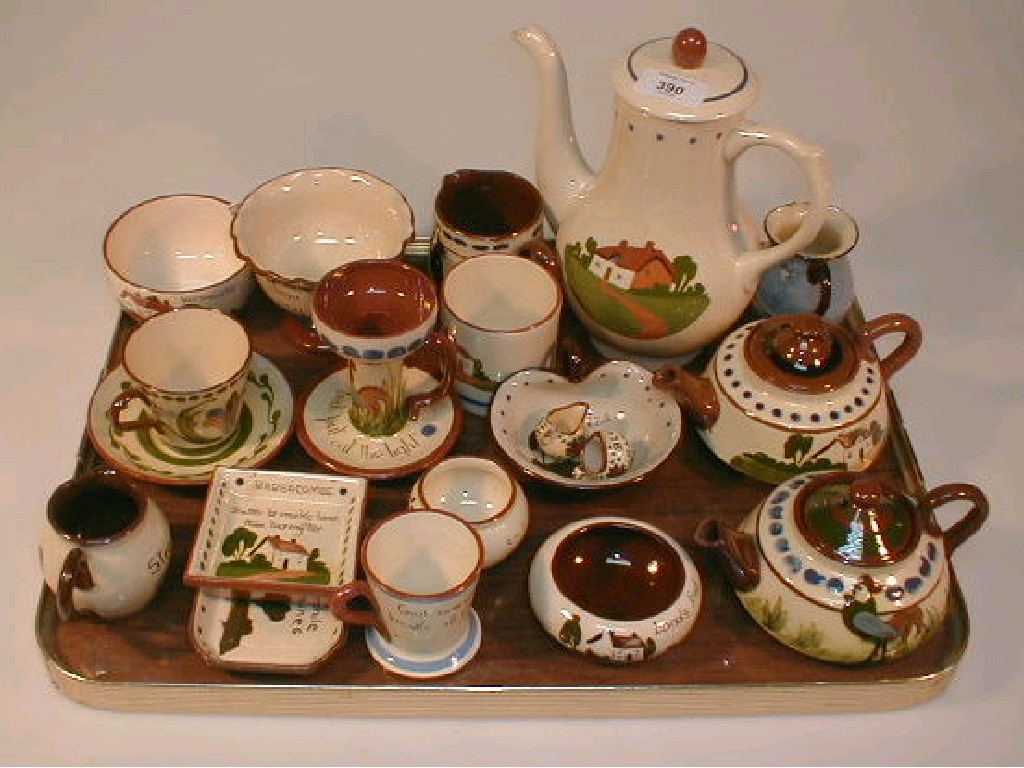 Appraisal: A collection of Devon ware including coffee pot two teapots