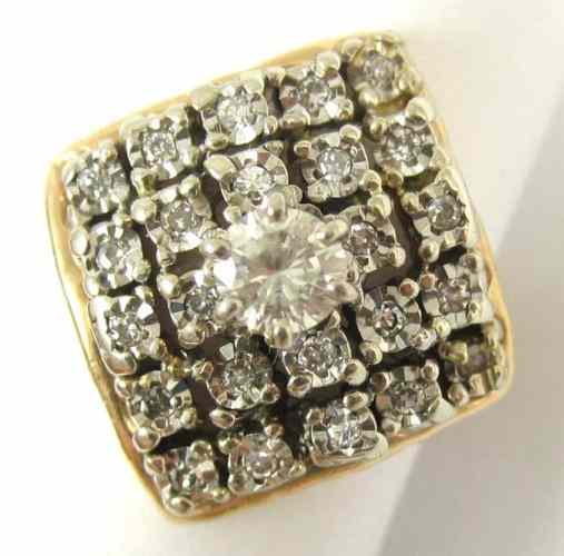 Appraisal: DIAMOND AND FOURTEEN KARAT GOLD RING set with round-cut diamonds