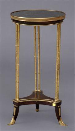 Appraisal: DIRECTOIRE-STYLE GILT-METAL-MOUNTED GUERIDON WITH MARBLE TOP The circular speckled black