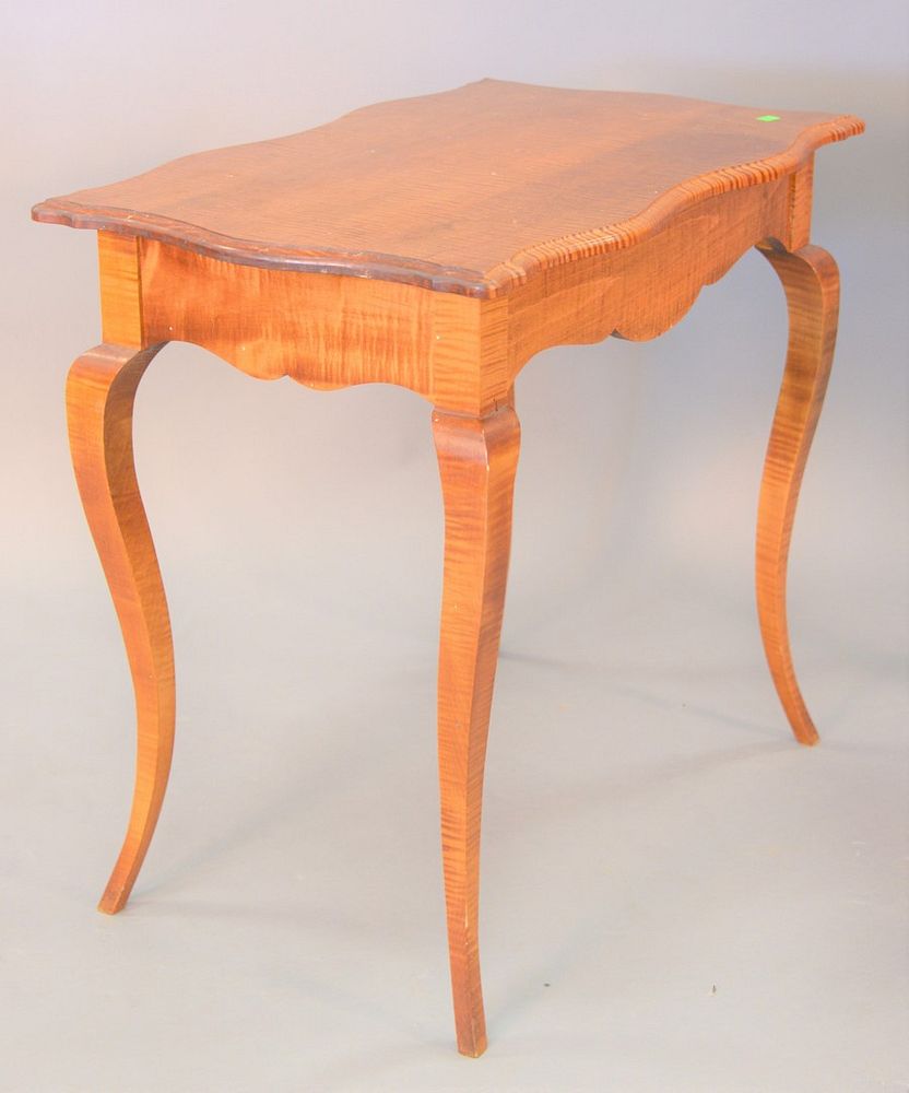 Appraisal: Tiger maple shaped top table ht top x Tiger maple