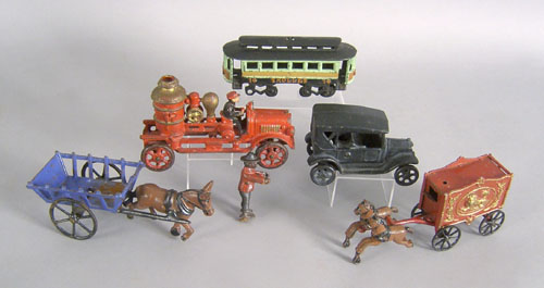 Appraisal: Group of reproduction cast iron and tin toys