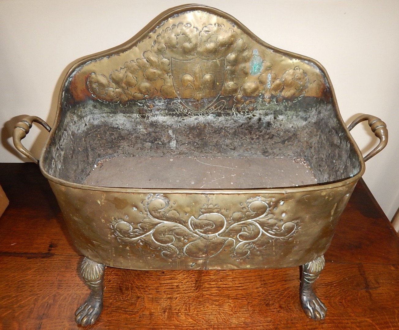 Appraisal: A brass two handled footman stand with embossed engraved decoration