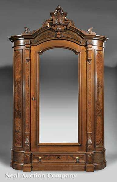 Appraisal: A Large American Renaissance Carved and Burled Walnut Armoire mid-