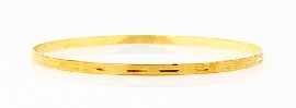 Appraisal: An ct gold round bangle with diamond cut decoration inner