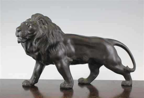 Appraisal: A Japanese Meiji period bronze figure of a prowling lion