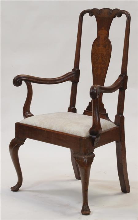 Appraisal: A George II inlaid walnut armchair the shaped top-rail over