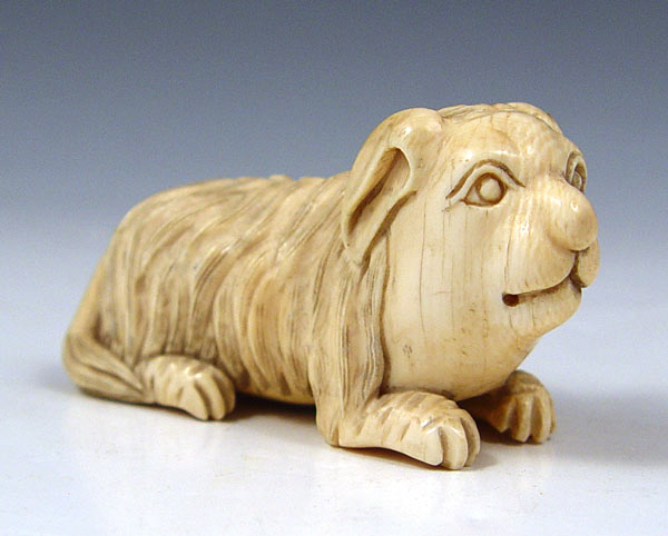 Appraisal: CHINESE CARVED IVORY FOO DOG Unsigned Measures '' h x