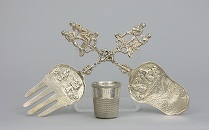 Appraisal: A Pair of Sterling Silver Servers and a Shot Cup