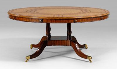 Appraisal: Regency style leather-top table circular top with tooled leather surface