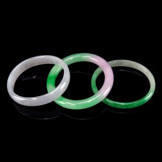 Appraisal: Three Chinese Jade Bangles Three Chinese Jade Bangles Unsigned Good