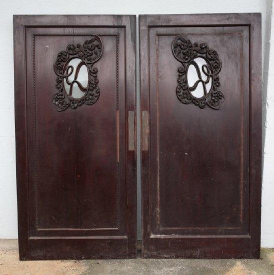 Appraisal: A pair of mahogany doors from the Cadina Caf Cheltenham