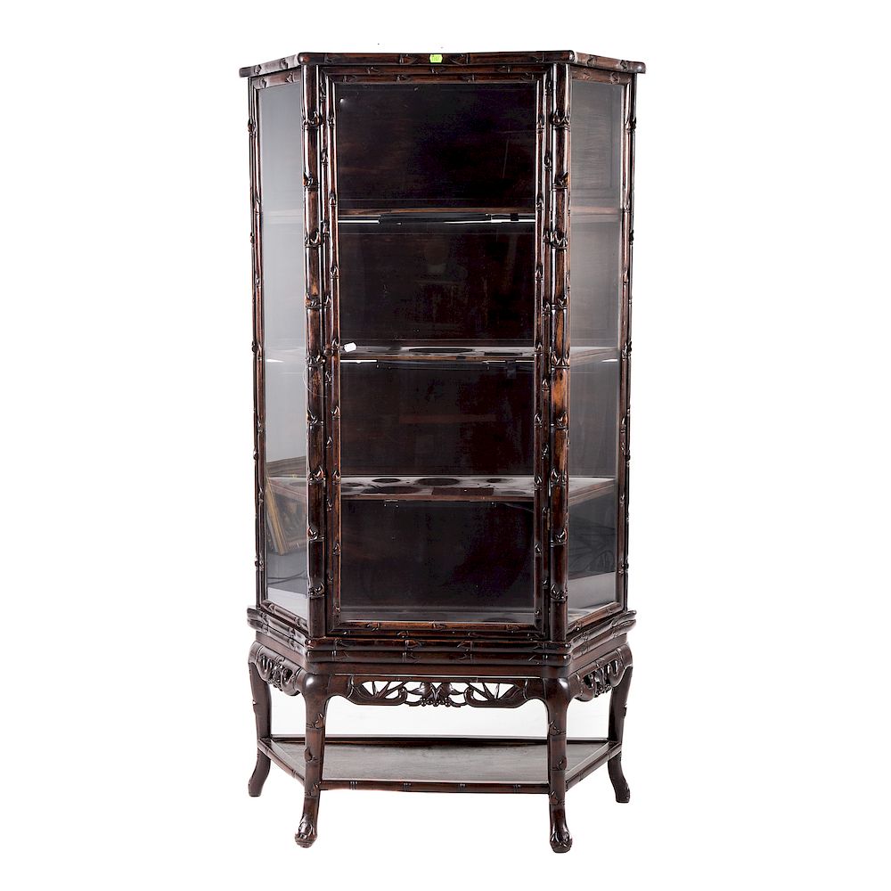 Appraisal: Chinese carved hardwood display cabinet late th early th century