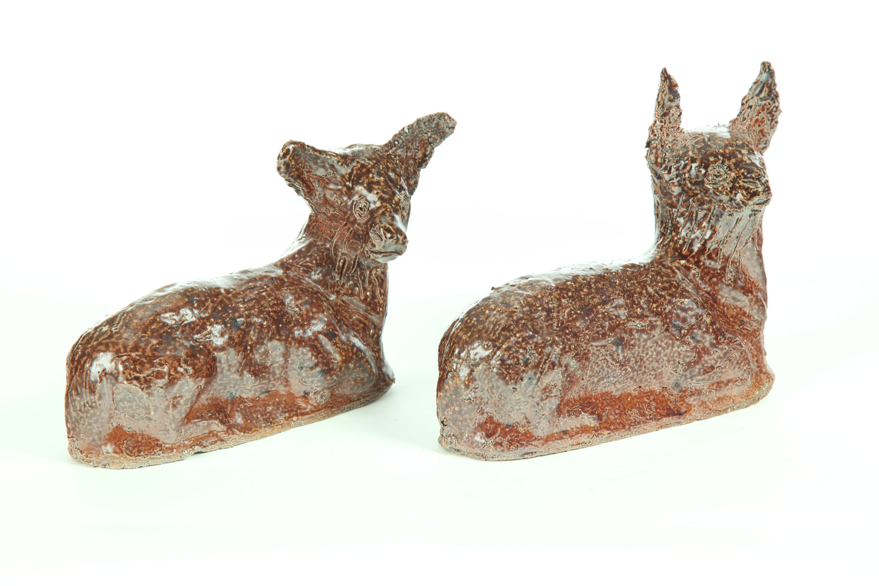 Appraisal: TWO SEWERTILE DEER Ohio early th century Two similar long