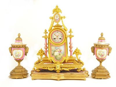 Appraisal: A mid th century ormolu and porcelain mounted mantel clock